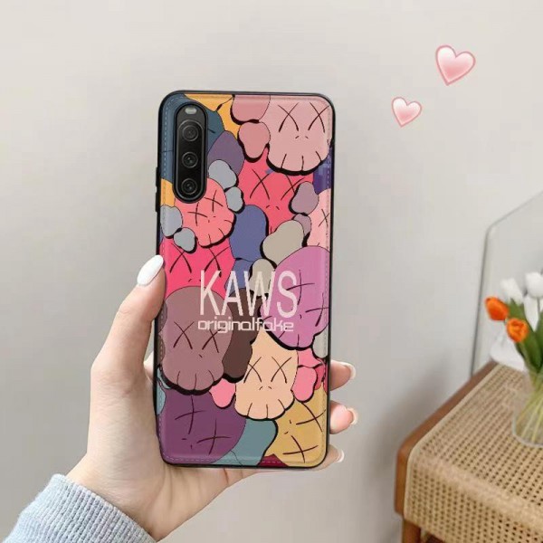 Kaws カウズハイブランドエクスぺリア 1 10 5 v iii ivカバー メンズ レディース女性男性向けブランドスマホケース  xperia1V/ace ivカバーブランドiphone galaxy xperia全機種対応エクスぺリア 1 10v 2023ケース 激安 ショルダー