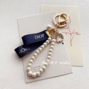 ブランドDior ディオール キーホルダー 真銖付きキーチェーン 女性 ディオール風 パールリボン キーホルダー バッグチャーム キーリング かわいい アクセサリー