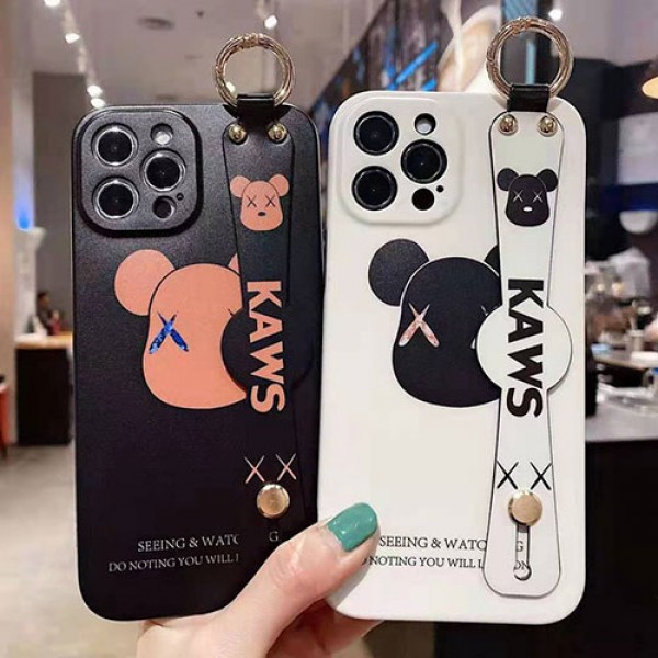 カウズ ブランド iphone12/12 pro/12 pro maxケース 韓国風 ホルダー付き KAWS 個性潮 iphone x/xr/xs/xs maxケース 落下防止 ファッション ins風 iphone 11/11 pro/11 pro maxケース かわいい iphone x/8/7 plusケース大人気